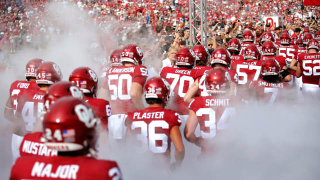 Oklahoma runs on to the field before the college football game between the University of Oklahoma Sooners and the University of Central Florida Knights at Gaylord Family Oklahoma-Memorial Stadium in Norman, Okla., Saturday, Oct., 21, 2023.